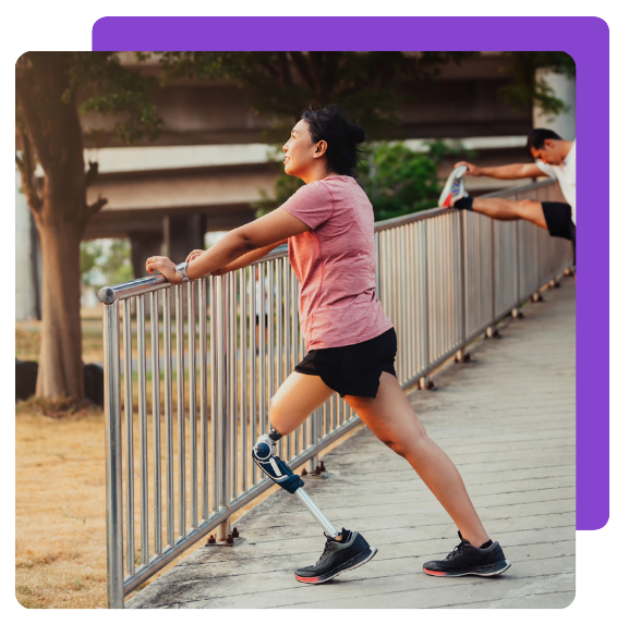 Athlete with prosthetic leg doing warm up exercise